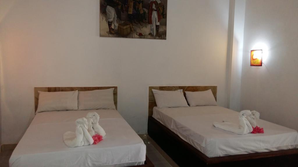 Amed Stop Inn Homestay, Rooftop Restaurant And Bar Esterno foto
