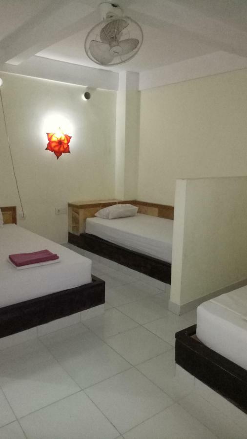 Amed Stop Inn Homestay, Rooftop Restaurant And Bar Esterno foto
