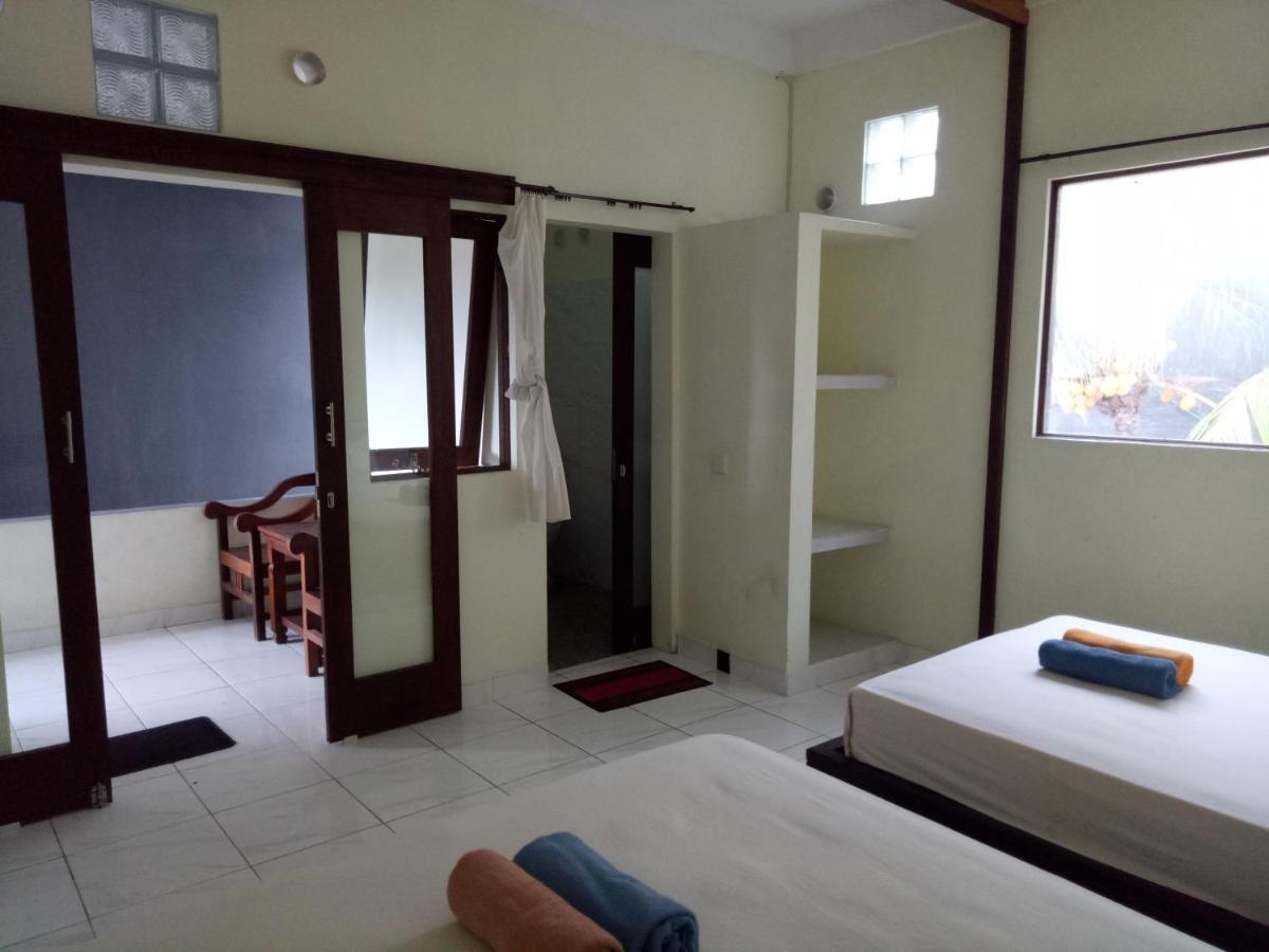 Amed Stop Inn Homestay, Rooftop Restaurant And Bar Esterno foto
