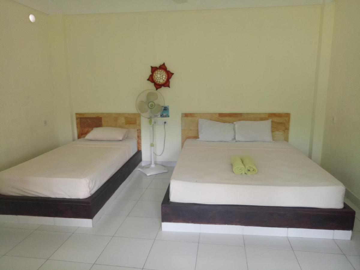 Amed Stop Inn Homestay, Rooftop Restaurant And Bar Esterno foto
