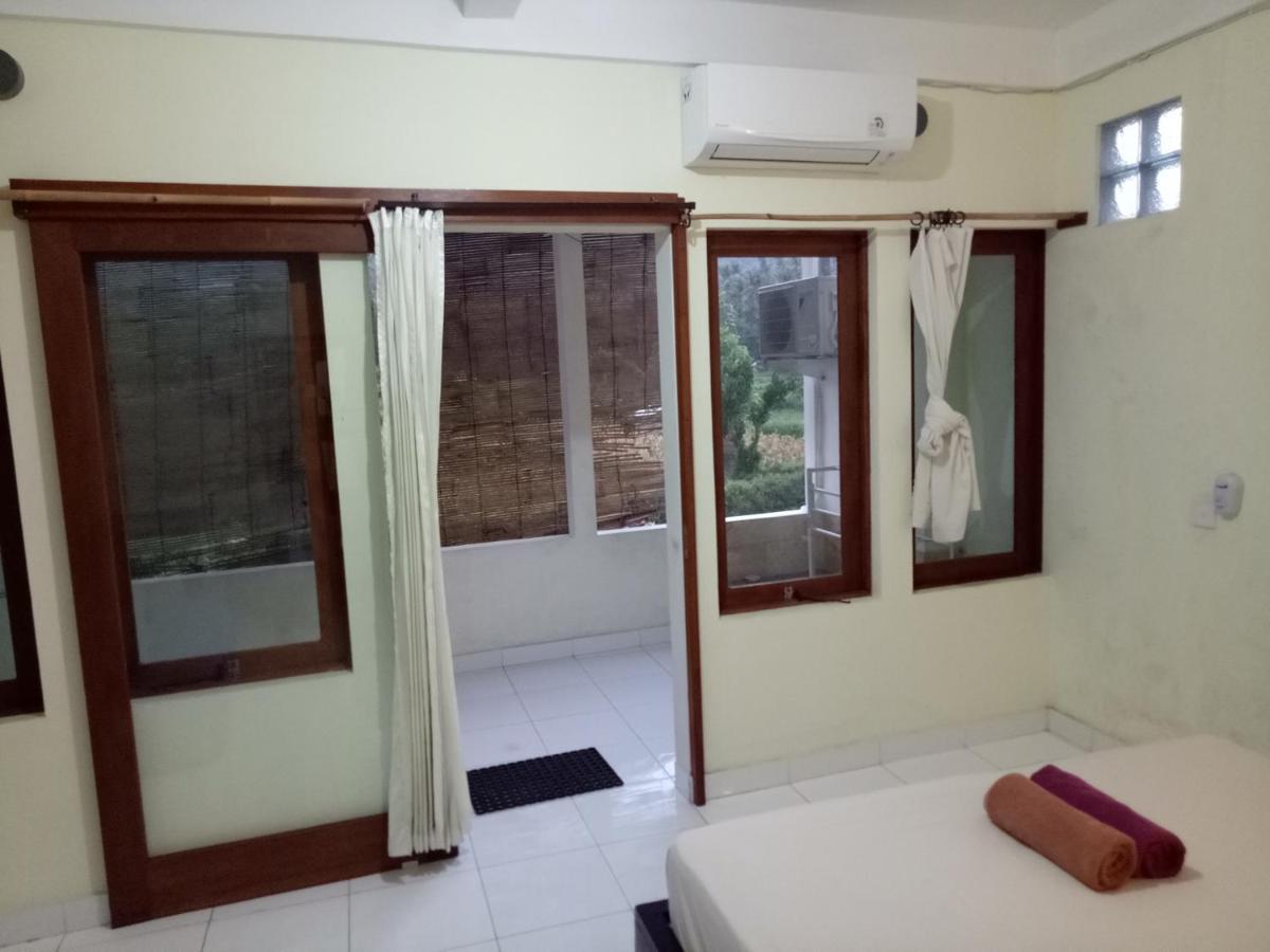Amed Stop Inn Homestay, Rooftop Restaurant And Bar Esterno foto